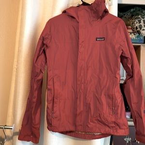 Burnt orange Patagonia raincoat